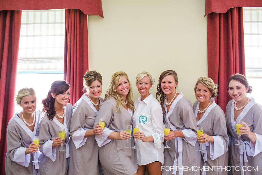 Bride and Bridesmaids Drinking Mimosas 